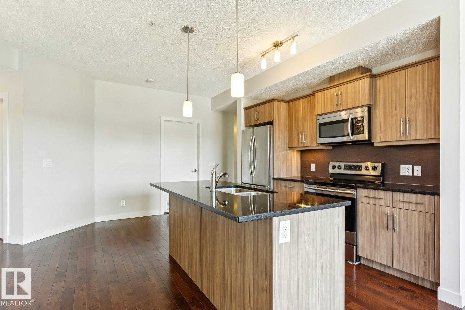 #217 10523 123 ST NW