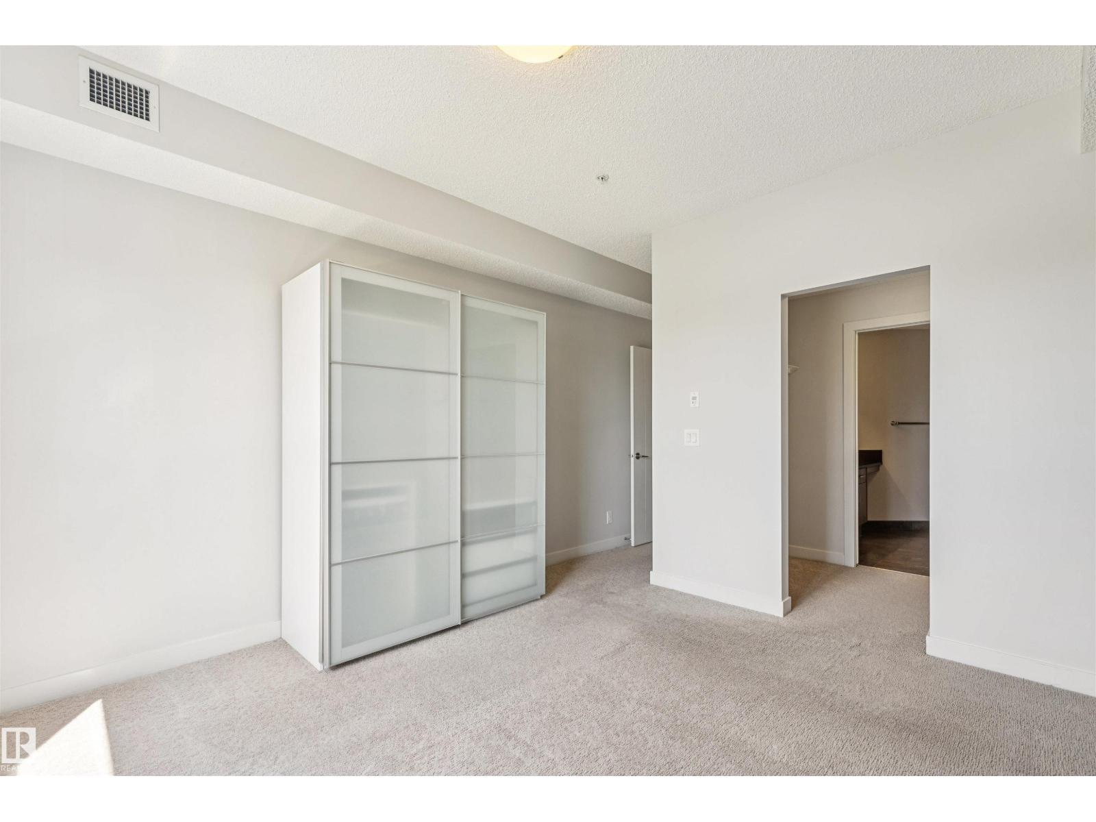 #217 10523 123 ST NW