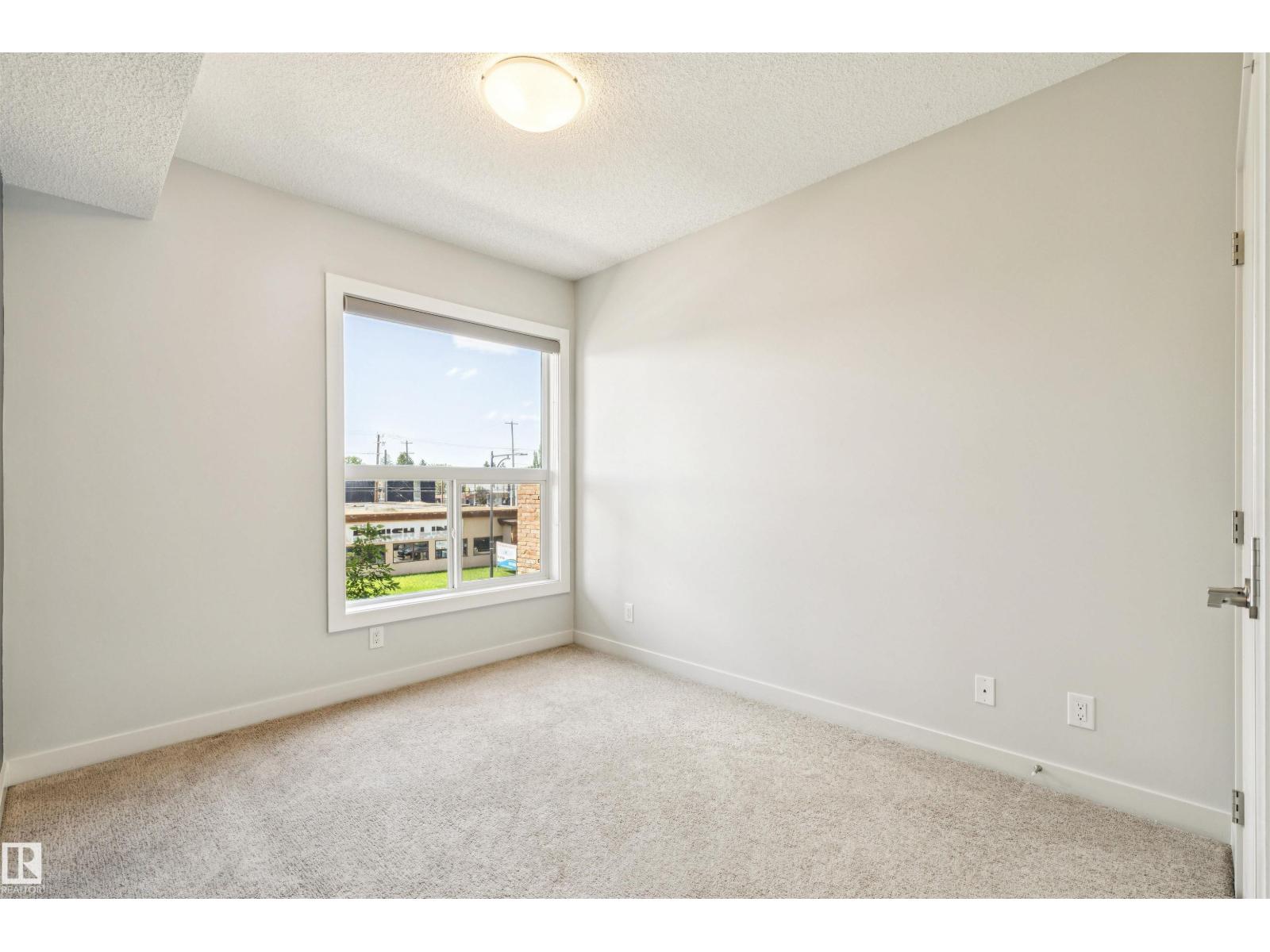 #217 10523 123 ST NW