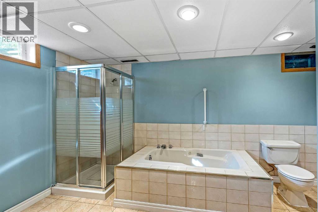 10607 Maplecreek Drive SE, Calgary, Alberta  T2J 1V2 - Photo 41 - A2348433