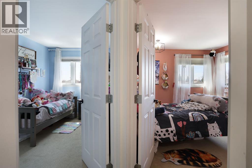 75 Parkland Close E, Brooks, Alberta  T1R 0M2 - Photo 35 - A2306538
