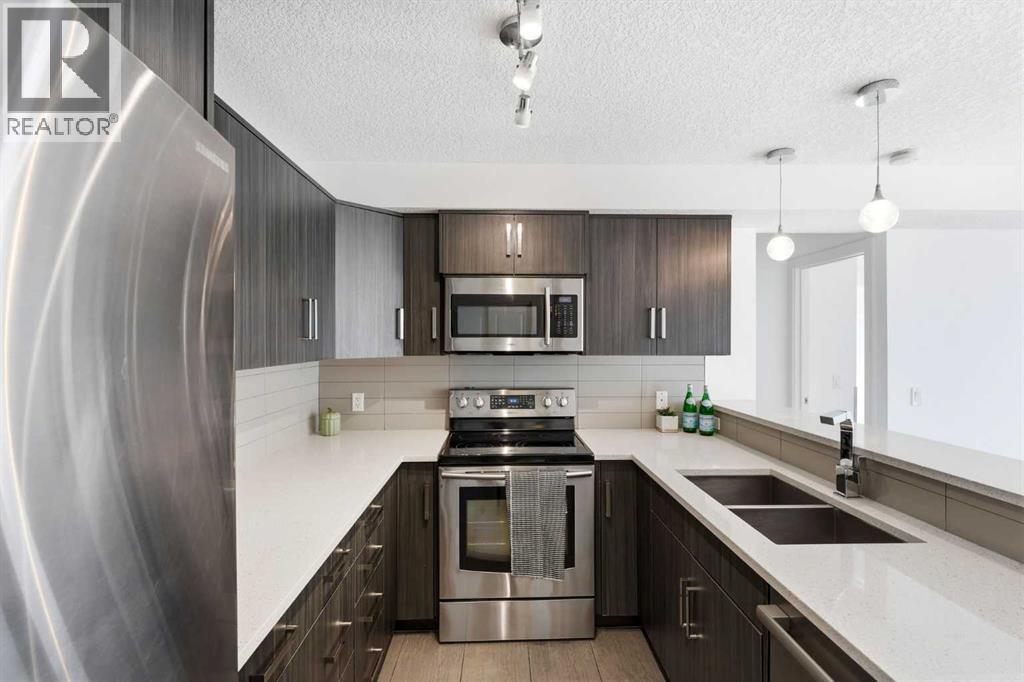 203, 611 Edmonton Trail NE