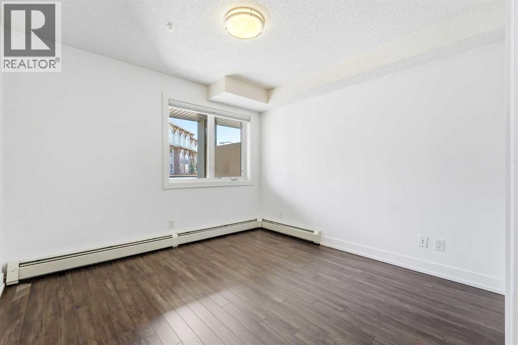 203, 611 Edmonton Trail NE