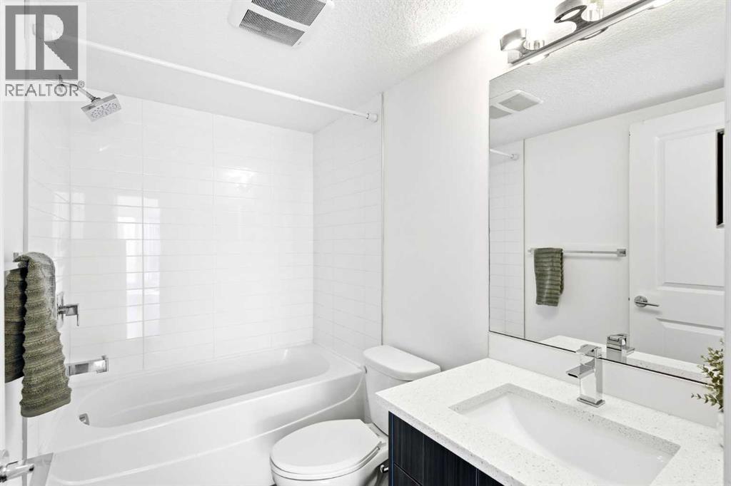 203, 611 Edmonton Trail NE