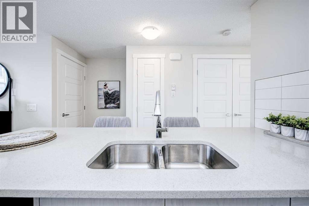 101, 260 Rowley Way NW