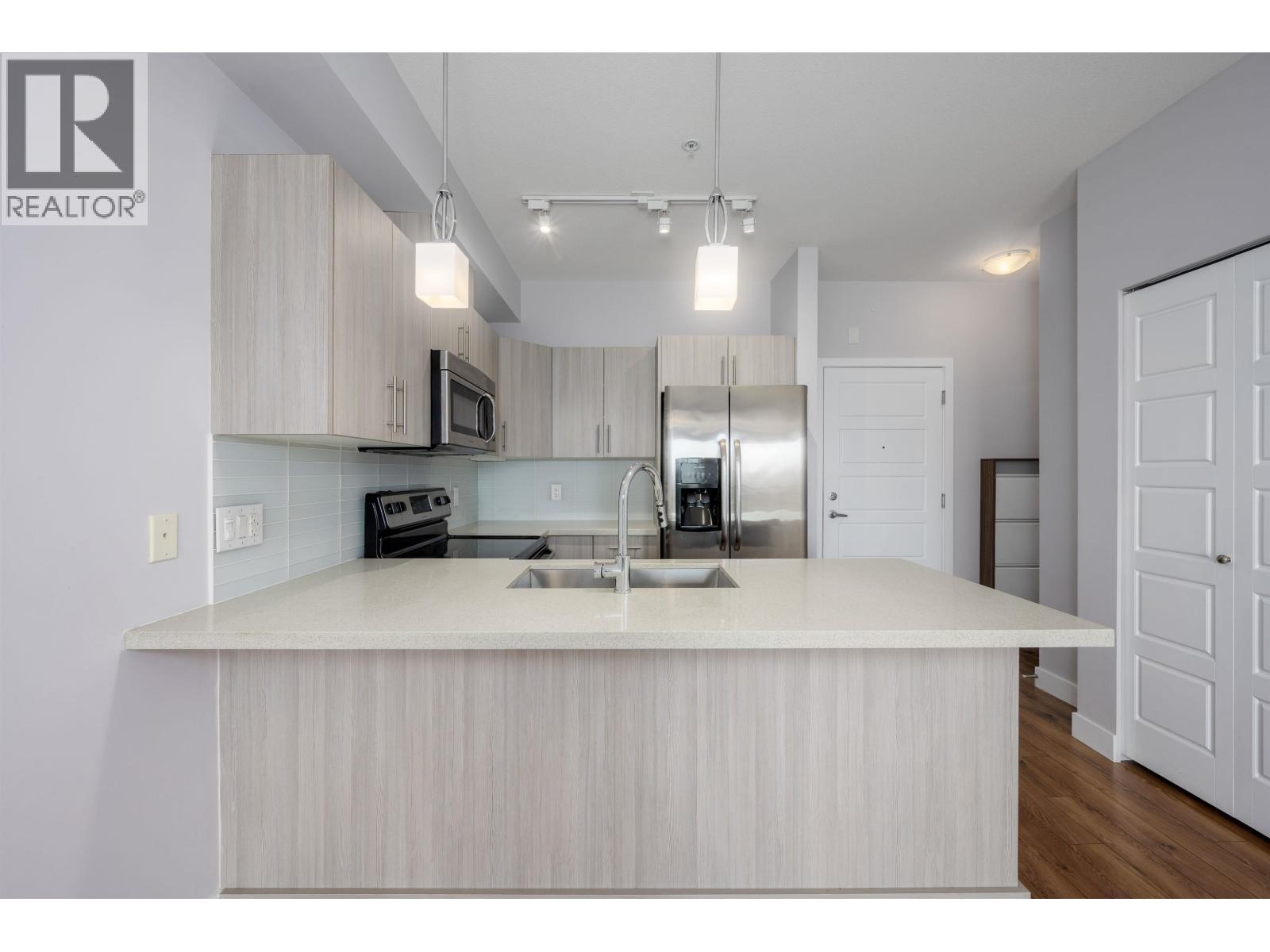 311 12070 227 STREET