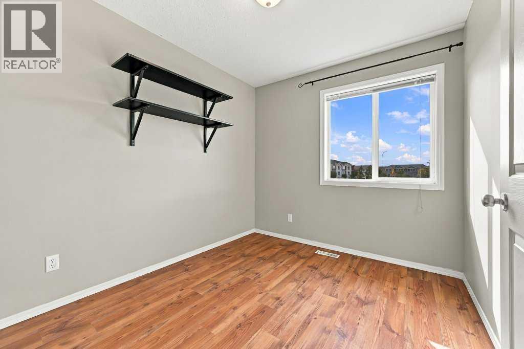 303, 2005 Luxstone Boulevard SW