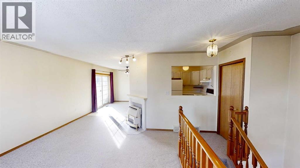 B, 9406 100 Avenue