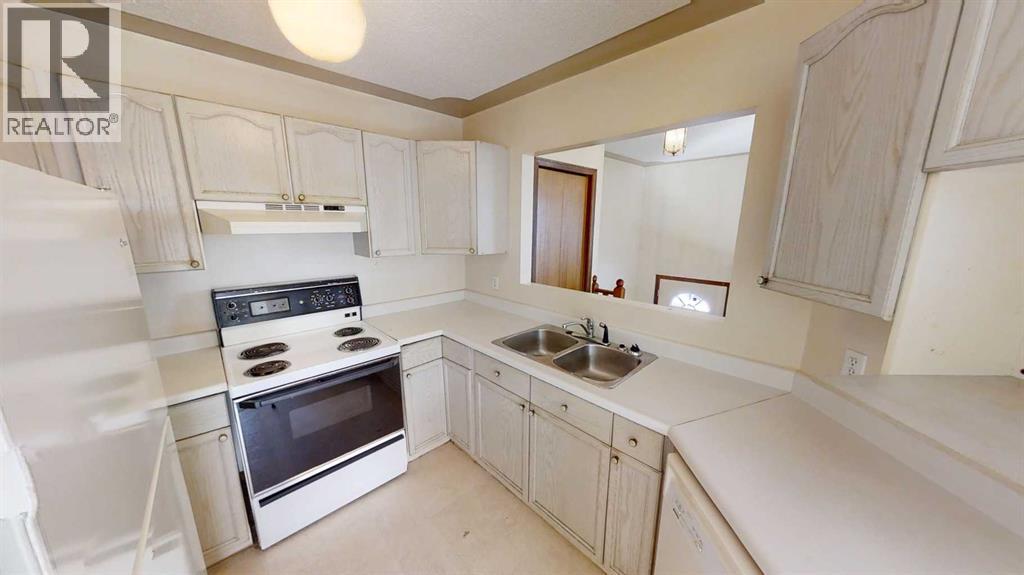 B, 9406 100 Avenue