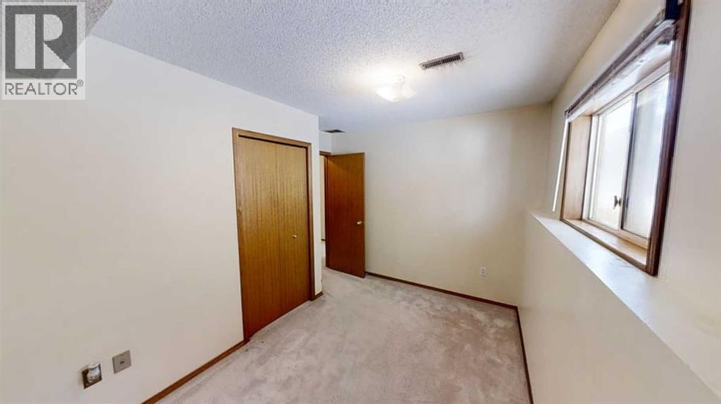 B, 9406 100 Avenue