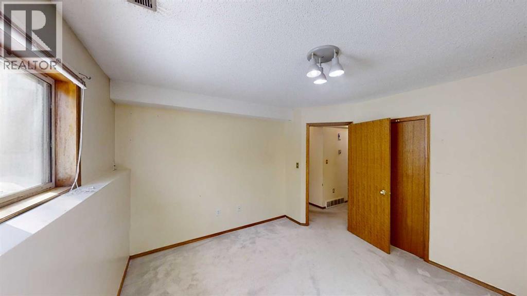 B, 9406 100 Avenue