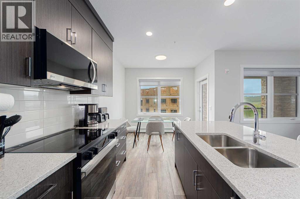 305, 125 Wolf Hollow Crescent SE