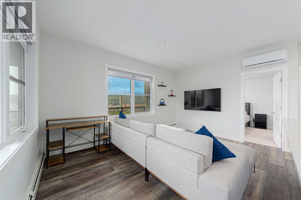 305, 125 Wolf Hollow Crescent SE