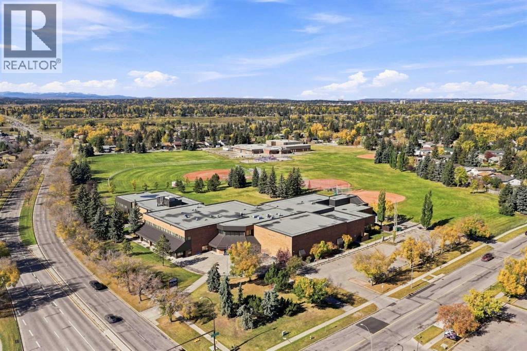 220, 2022 Canyon Meadows Drive SE