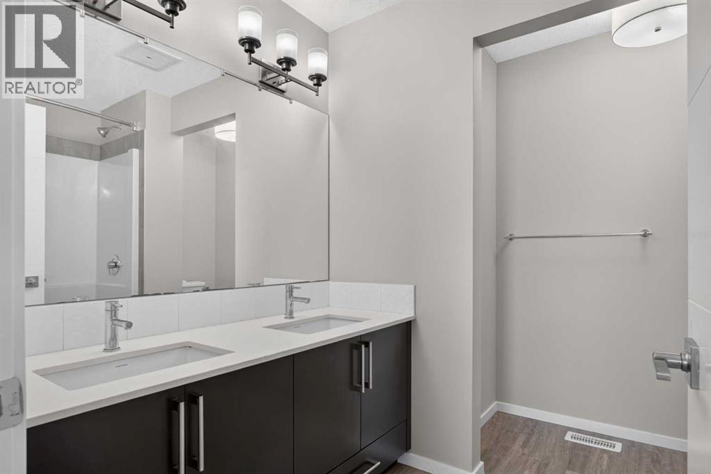 203, 315 Redstone  NE