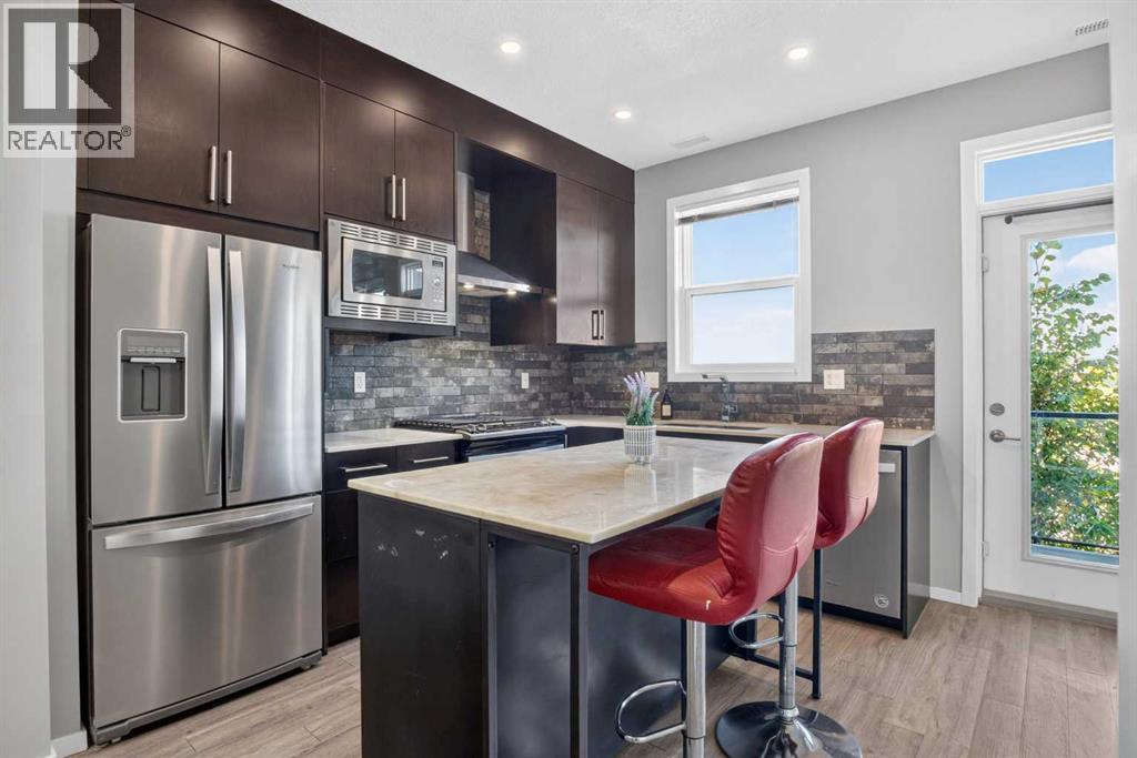 203, 315 Redstone  NE