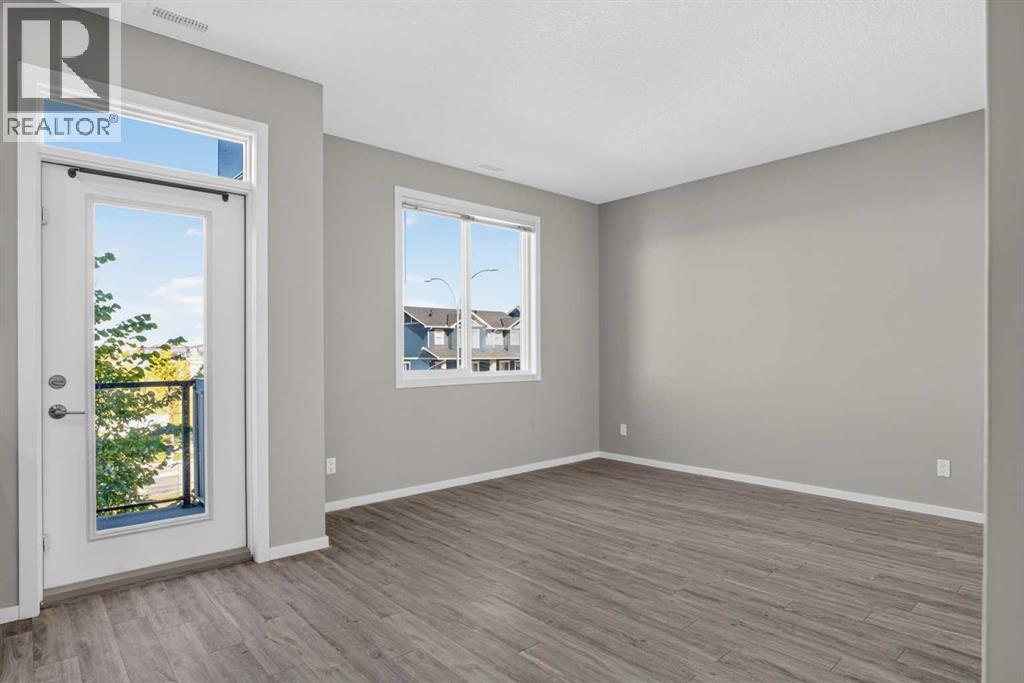 203, 315 Redstone  NE
