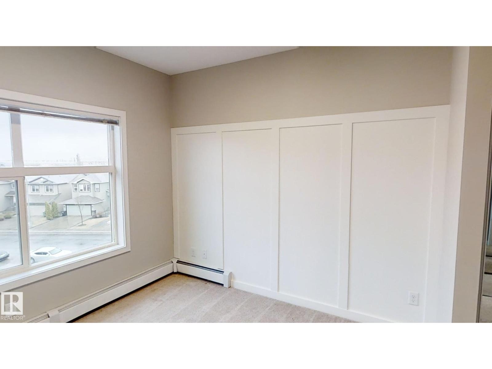 #404 5510 Schonsee DR NW