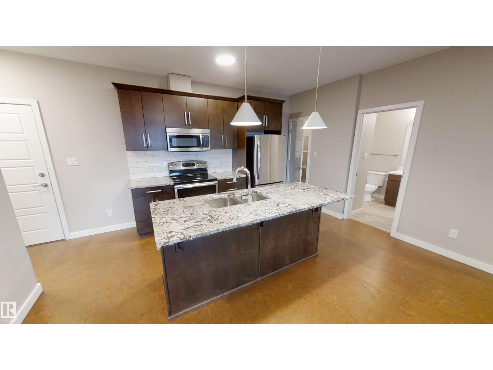 #404 5510 Schonsee DR NW