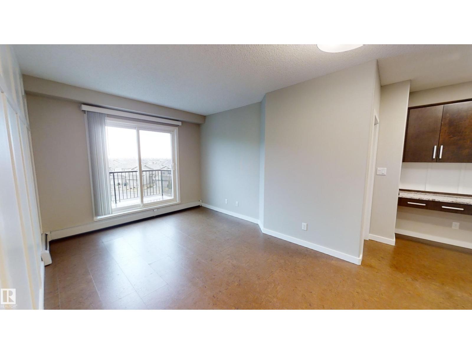 #404 5510 Schonsee DR NW