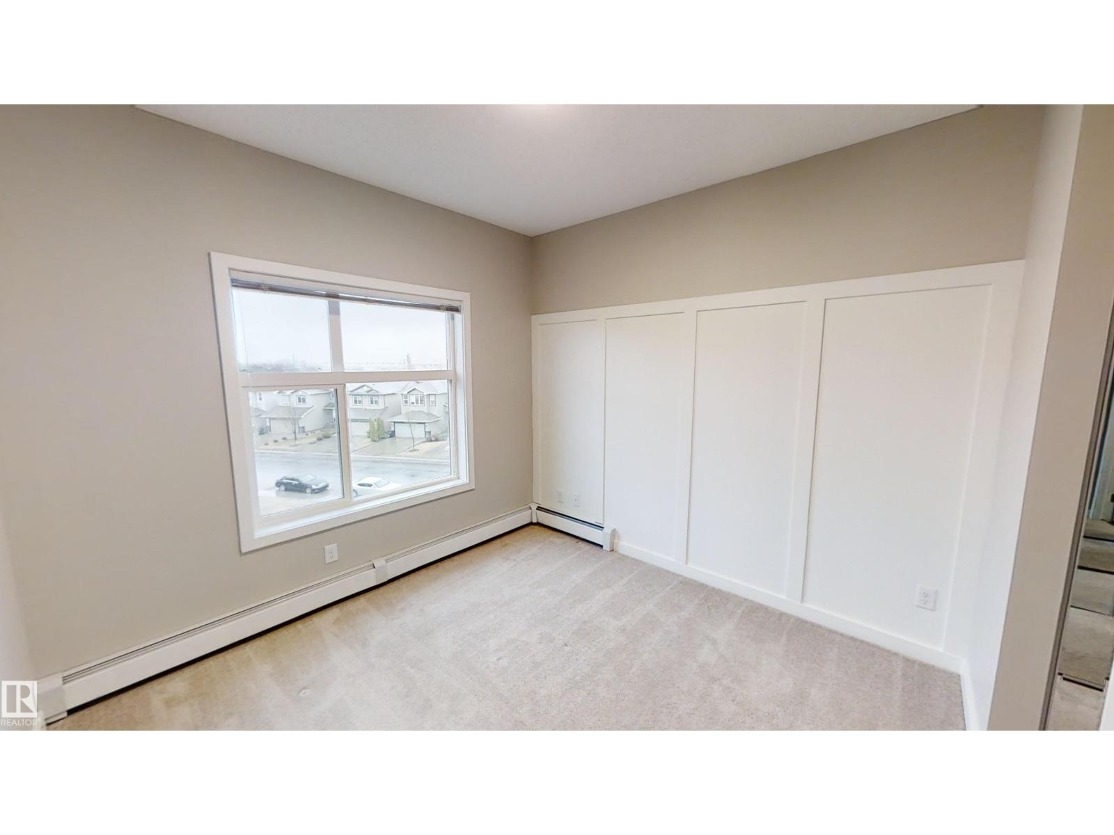 #404 5510 Schonsee DR NW