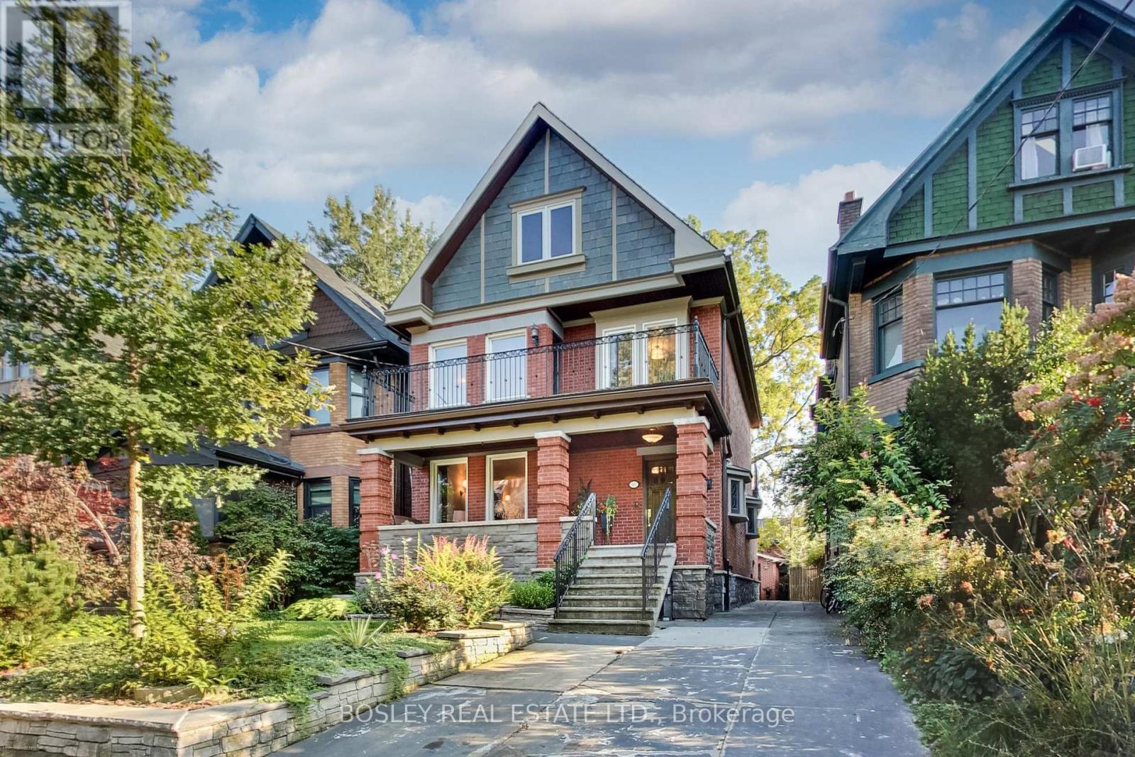 Welcome to your forever home in prime High Park! Nestled on a quiet, picture-perfect, tree-lined street in one of Toronto's most coveted family neighbourhoods, this magnificent 3-storey detached masterpiece seamlessly blends timeless historic elegance with exceptional upgrades. From the moment you arrive, exquisite preserved details, including original stained glass accents, classic architectural charm, meticulous care warm the soul while top-tier mechanical systems ensure complete long-term peace of mind. Built on a rock solid foundation w/superior waterproofing, a Lifetime Slate Roof, updated 200-amp electrical service, a high-efficiency boiler & an on-demand hot water system, this property has been exceptionally maintained from top to bottom. This home offers 5 spacious bedrms, 4 upstairs & 1 ideally situated on the main flr, providing abundant room and flexibility for a growing family. The L/R serves as a cozy centrepiece, anchored by a traditional wood-burning fireplace. Culinary enthusiasts will adore the chef's kitchen, fully custom-designed w/solid cherry wood cabinetry, sitting area & Caesar-stone countertops,& premium appliances featuring Jenn-Air gas cooktop, microwave, B/I oven & warming drawer. Upstairs, the primary bedroom suite acts as a peaceful sanctuary, complete with its own wood-burning fireplace, a sitting area & a private w/o terrace. The 2nd floor laundry room opens directly onto a sun-drenched, south-facing large terrace overlooking the serene neighbourhood.The lower level extends your living space even further with a fully finished basement apartment & its own dedicated separate entrance. Perfectly suited as an expansive in-law suite, multi-generational retreat, or a high-demand rental unit, this versatile suite provides endless potential. Complete with a rare detached 2-car garage, this rare gem sits just steps from the lush green trails of High Park, top-rated schools, vibrant local cafes & transit, offering a masterclass in Toronto Living (id:48254)