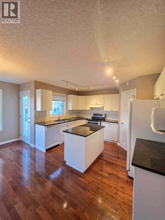 127 Hampstead Circle NW, Calgary, Alberta  T3A 5P3 - Photo 3 - A2328201