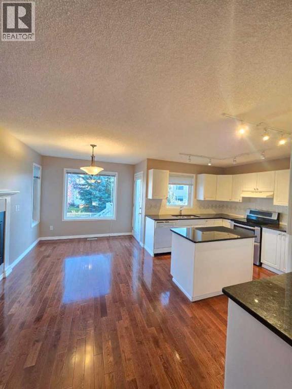 127 Hampstead Circle NW, Calgary, Alberta  T3A 5P3 - Photo 4 - A2328201