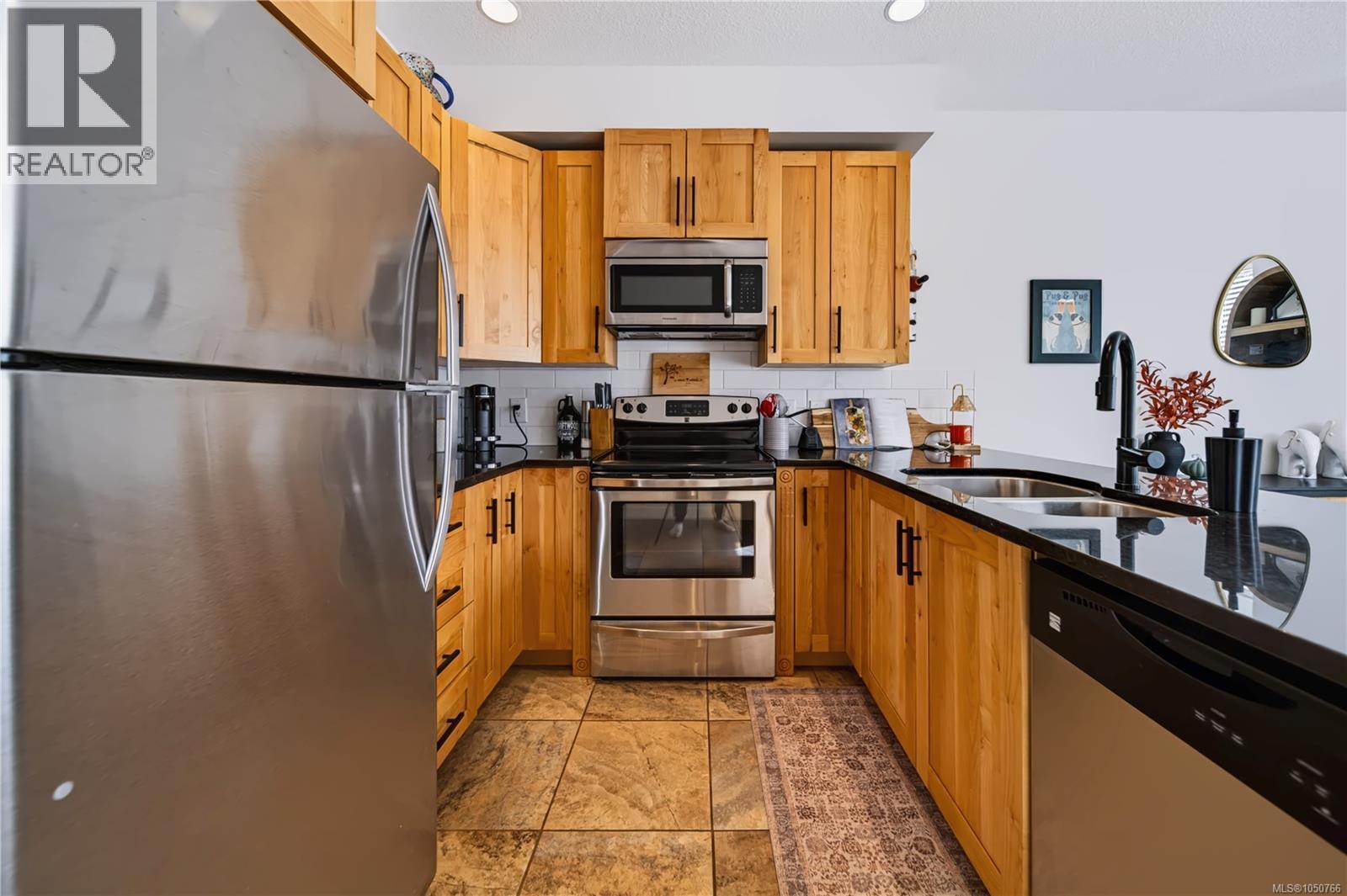 102 6057 Doumont Rd