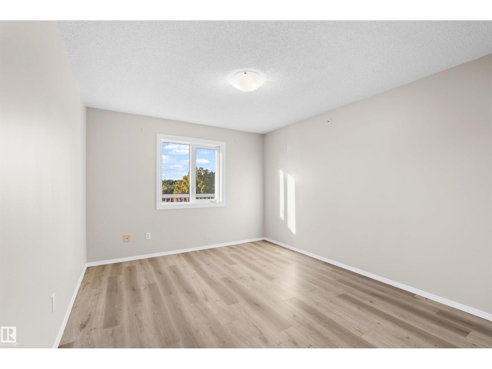 #408 10610 76 ST NW