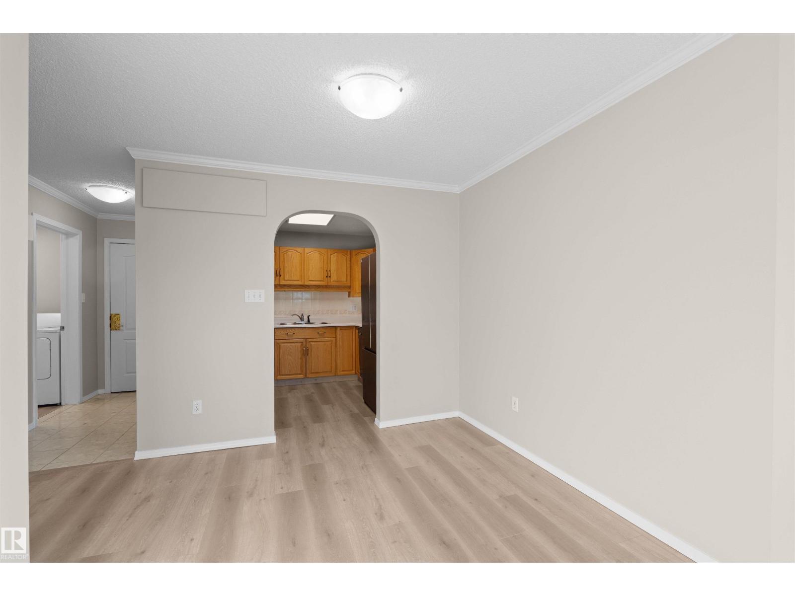 #408 10610 76 ST NW