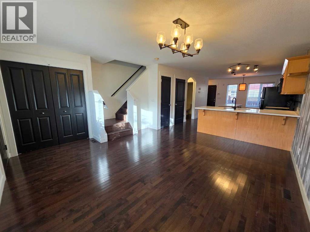 153 Rainbow Falls Manor W, Chestermere, Alberta  T1X 0M3 - Photo 9 - A2337231