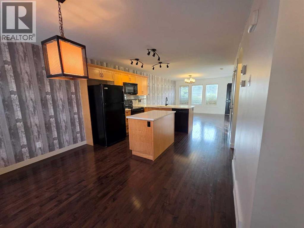 153 Rainbow Falls Manor W, Chestermere, Alberta  T1X 0M3 - Photo 4 - A2337231