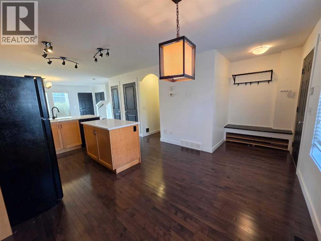 153 Rainbow Falls Manor W, Chestermere, Alberta  T1X 0M3 - Photo 5 - A2337231
