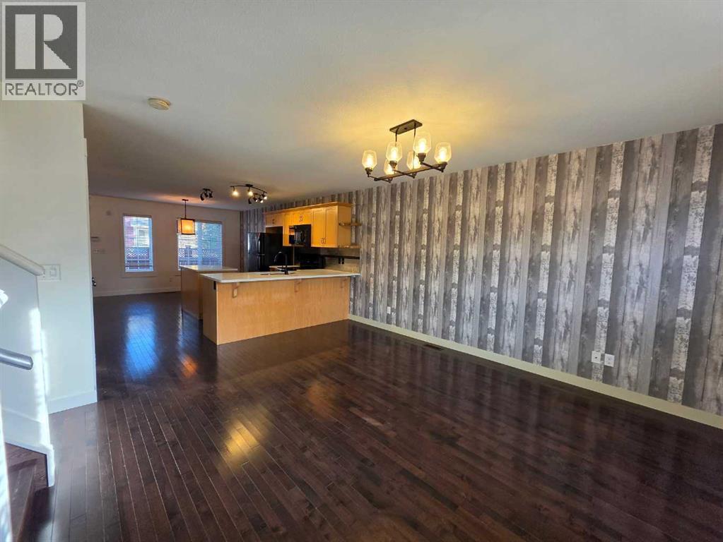 153 Rainbow Falls Manor W, Chestermere, Alberta  T1X 0M3 - Photo 3 - A2337231