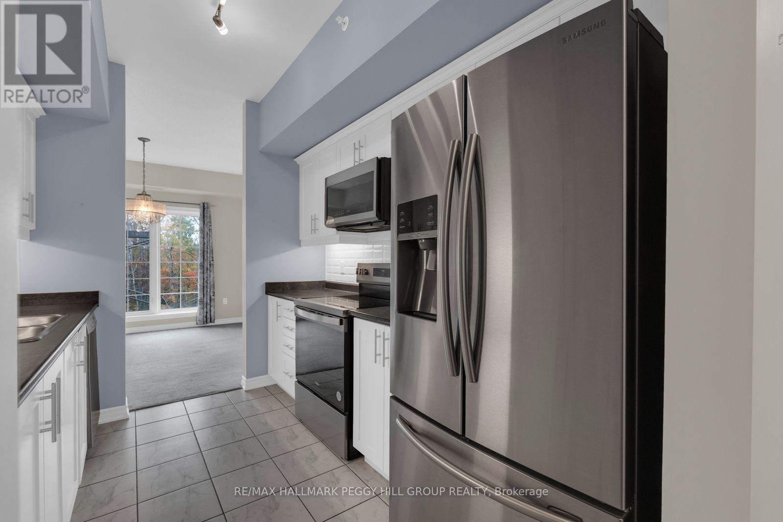 212 - 5 Greenwich Street, Barrie (Ardagh), Ontario  L4N 7Y8 - Photo 4 - S13854652