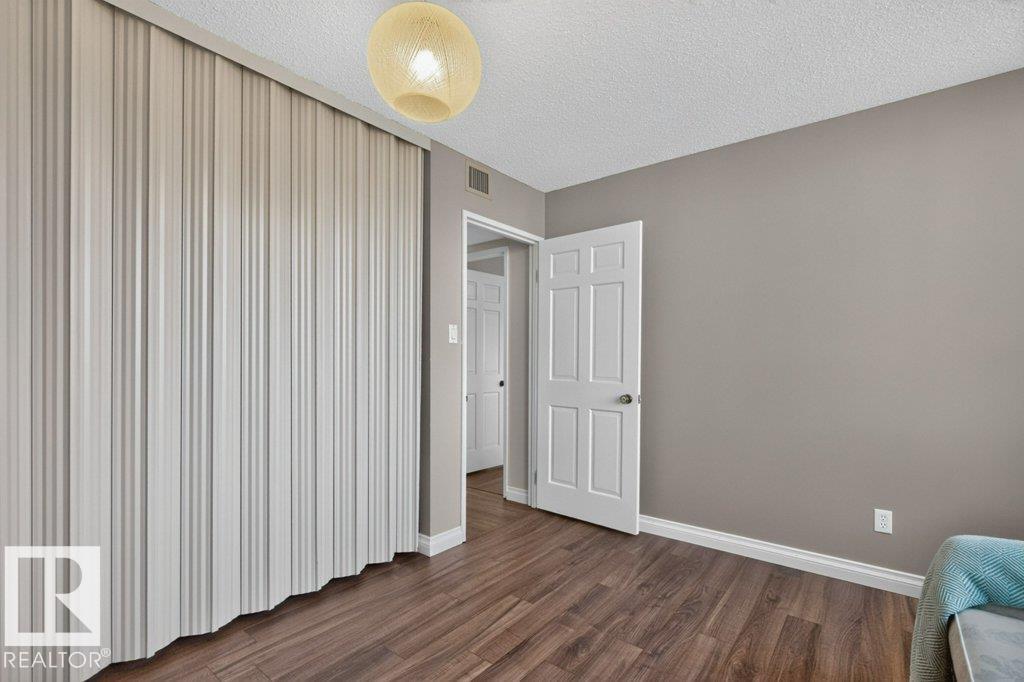 #703 9921 104 ST NW