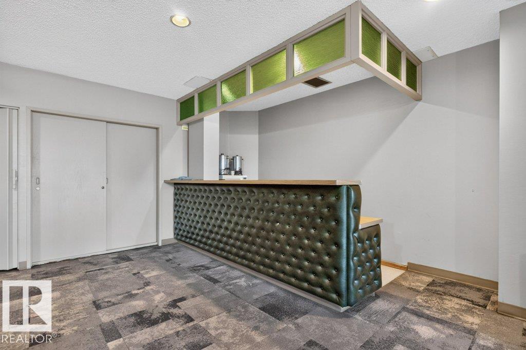 #703 9921 104 ST NW