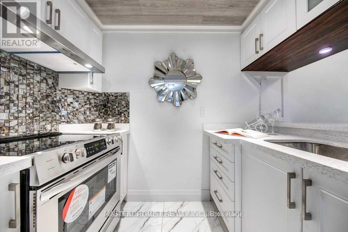 306 - 7 Bishop Avenue, Toronto, Ontario  M2M 4J4 - Photo 4 - C13855066