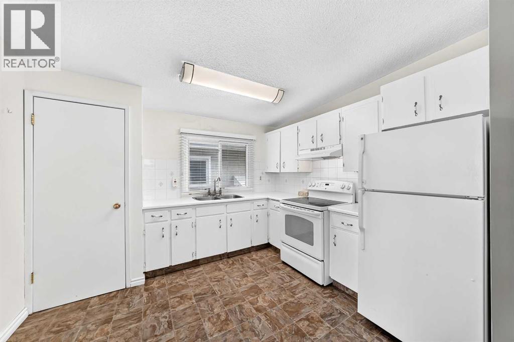 7409 37 Avenue NW, Calgary, Alberta  T3B 1W8 - Photo 12 - A2349302