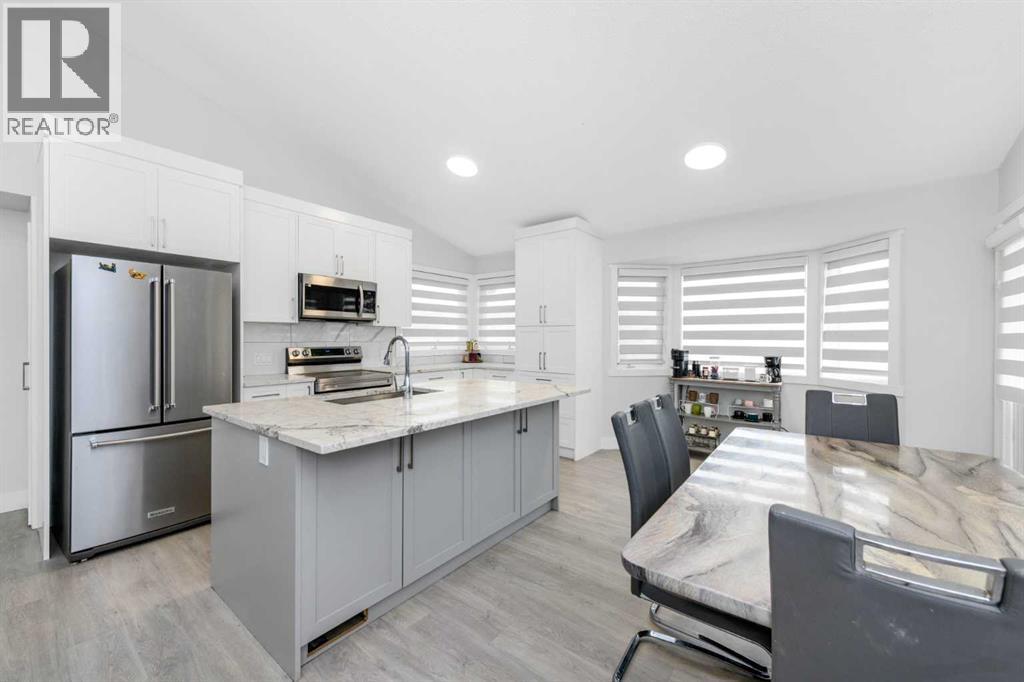 119 Pasadena Green Ne, Calgary, Alberta  T1Y 6M9 - Photo 10 - A2348496
