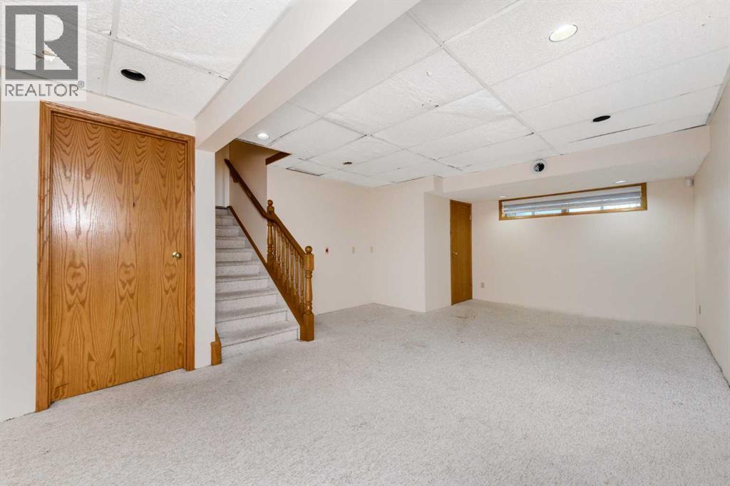 119 Pasadena Green Ne, Calgary, Alberta  T1Y 6M9 - Photo 28 - A2348496