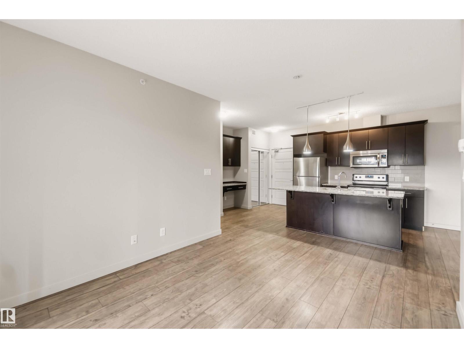 #414 5510 SCHONSEE DR NW