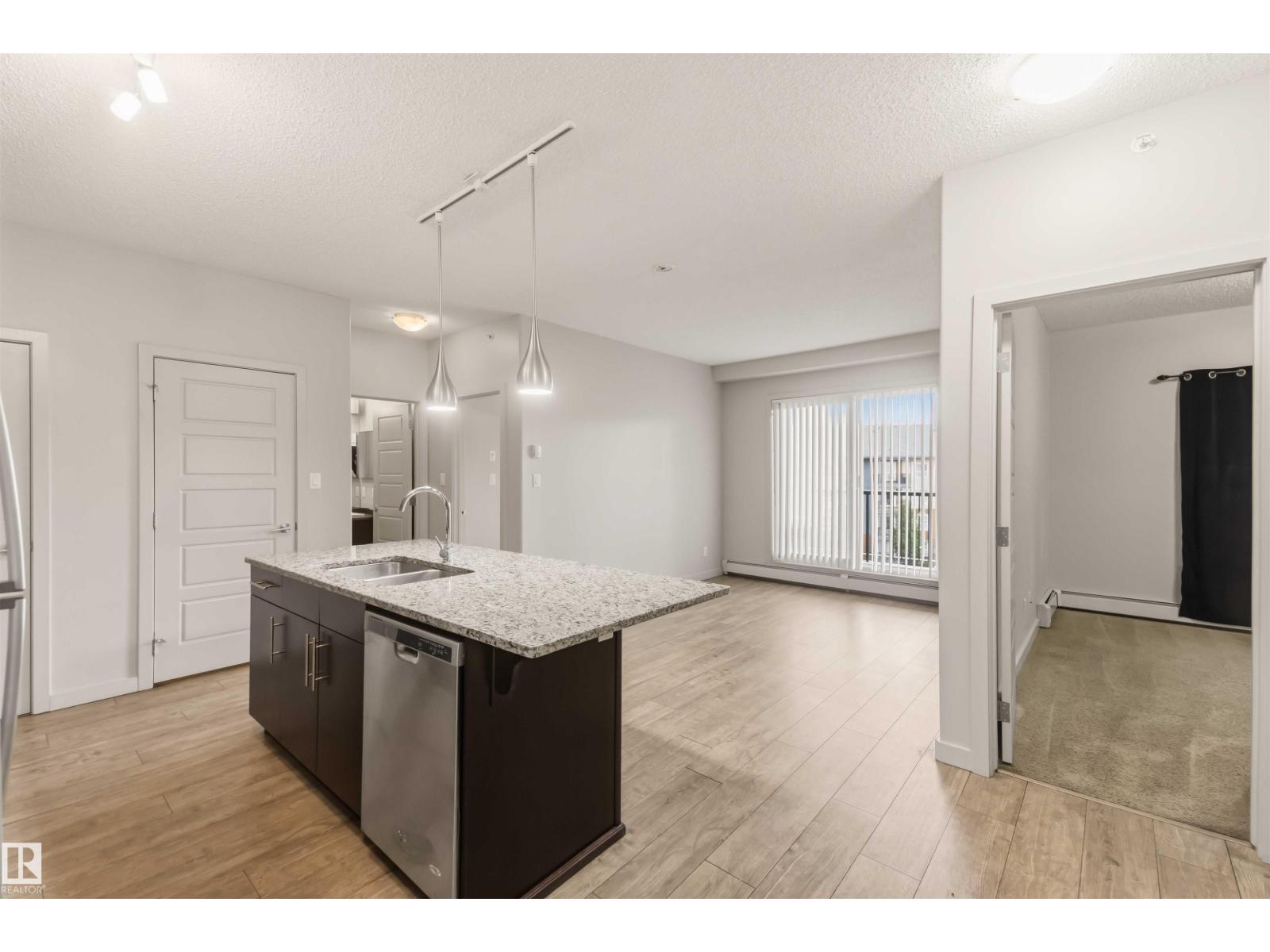 #414 5510 SCHONSEE DR NW