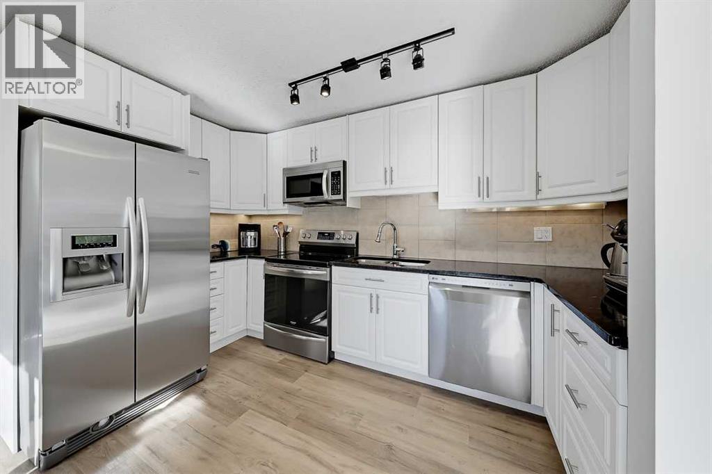 5, 64 Woodacres Crescent Sw, Calgary, Alberta  T2W 4V6 - Photo 5 - A2349998