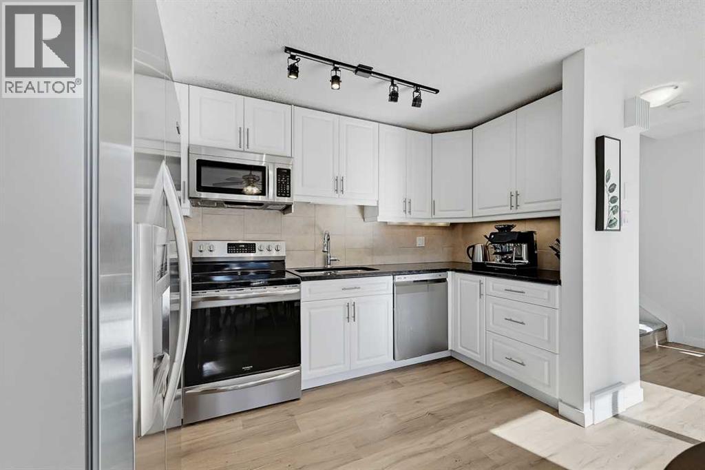 5, 64 Woodacres Crescent Sw, Calgary, Alberta  T2W 4V6 - Photo 10 - A2349998