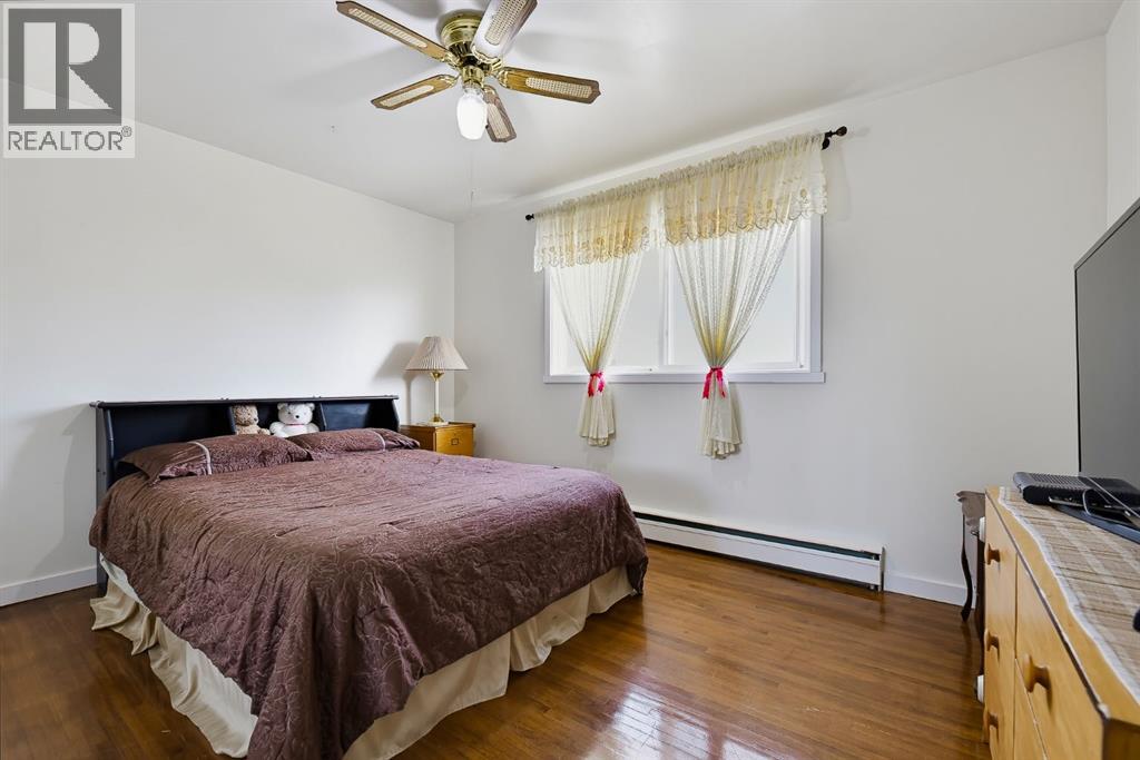 704 75 Avenue Sw, Calgary, Alberta  T2V 0S3 - Photo 12 - A2348452