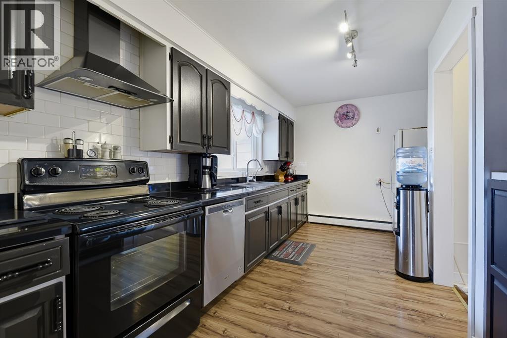 704 75 Avenue Sw, Calgary, Alberta  T2V 0S3 - Photo 8 - A2348452