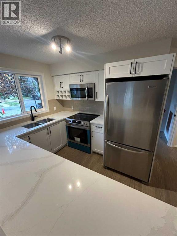 1112, 115 Prestwick Villas SE, Calgary, Alberta  T2Z 0M8 - Photo 11 - A2349438