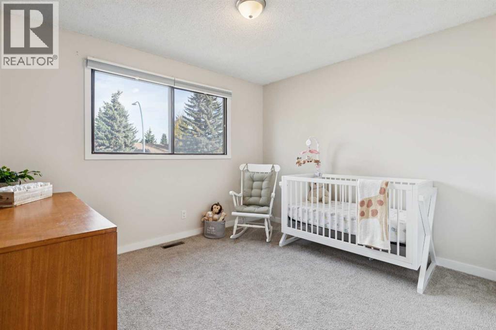 7 Woodgreen Crescent Sw, Calgary, Alberta  T2W 4A4 - Photo 24 - A2349261